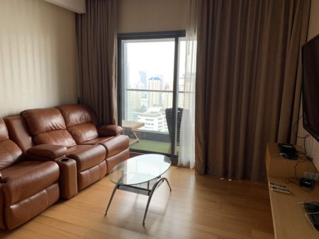 A 2-bedroom Bangkok condo for sale near BTS Nana is available on a high floor at Hyde Sukhumvit 13 luxury condominium