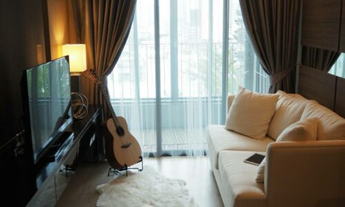 This condo in Noble Ploenchit features a nice pool view from a balcony and is available now for sale with the tenant