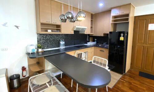 This renovated 2-bedroom condo is located in Thonglor in Baan Chan condominium in a quiet area