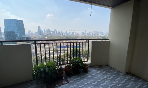 Cheap 2-bedroom Bangkok apartment for sale - large balcony - mid-floor - Monterey Place near MRT