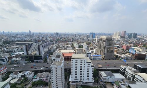 This penthouse duplex is a unique property near BTS National Stadium that is available now for sale at a promotional price.