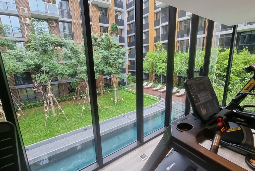 gym with pool view