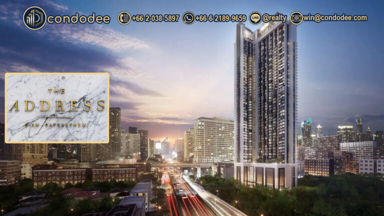 The Address Siam-Ratchathewi luxury condominium exterior with city skyline view and BTS Skytrain nearby in Bangkok. | คอนโด ดิ แอดเดรส สยาม-ราชเทวี หรูหรา วิวเมือง ใกล้ BTS ราชเทวี กรุงเทพ